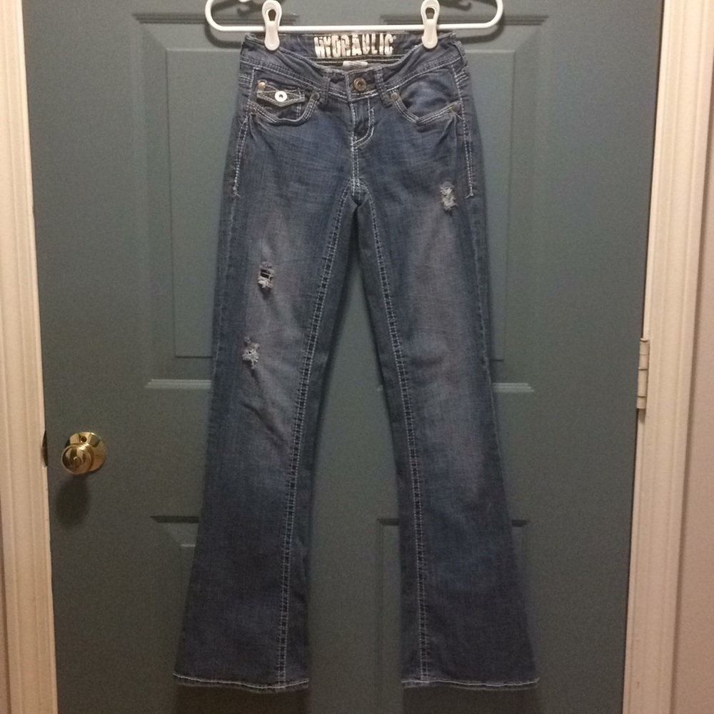 Hydraulic distressed jeans